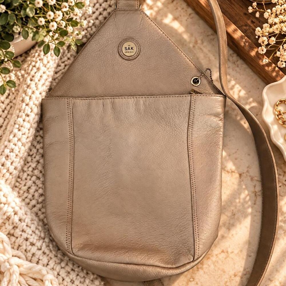 The sak originals champagne leather crossbody purse bag
